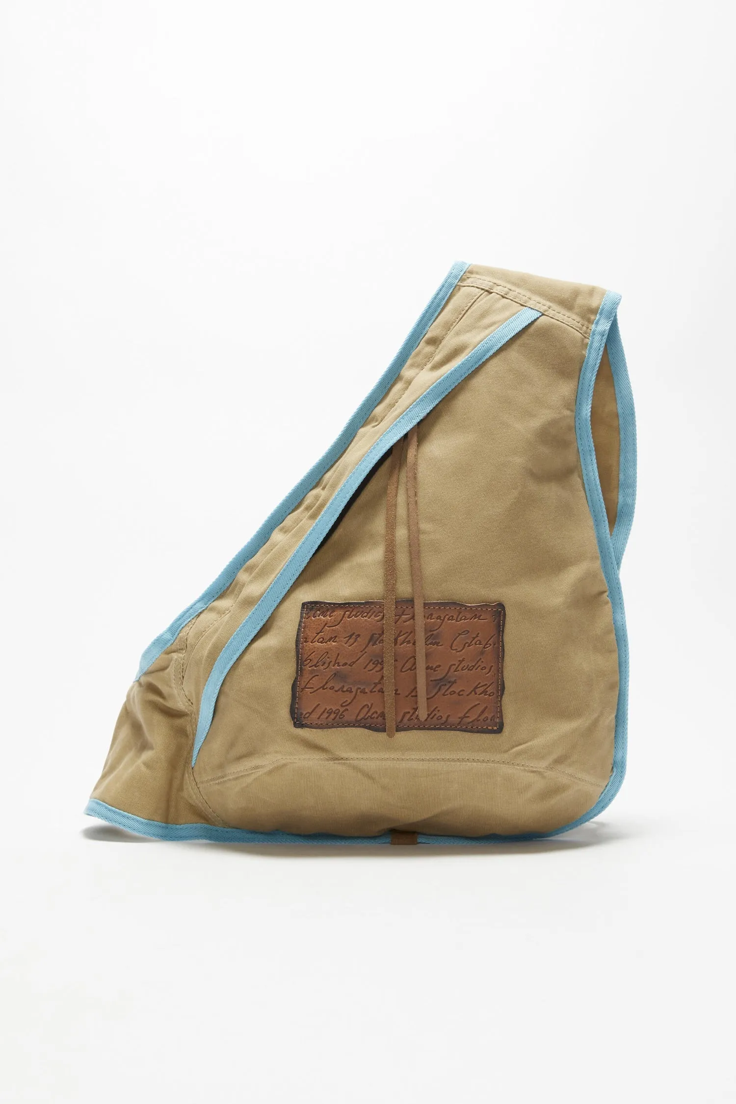 Acne Studios   SLING BACKPACK IN BEIGE/BLUE, SS24