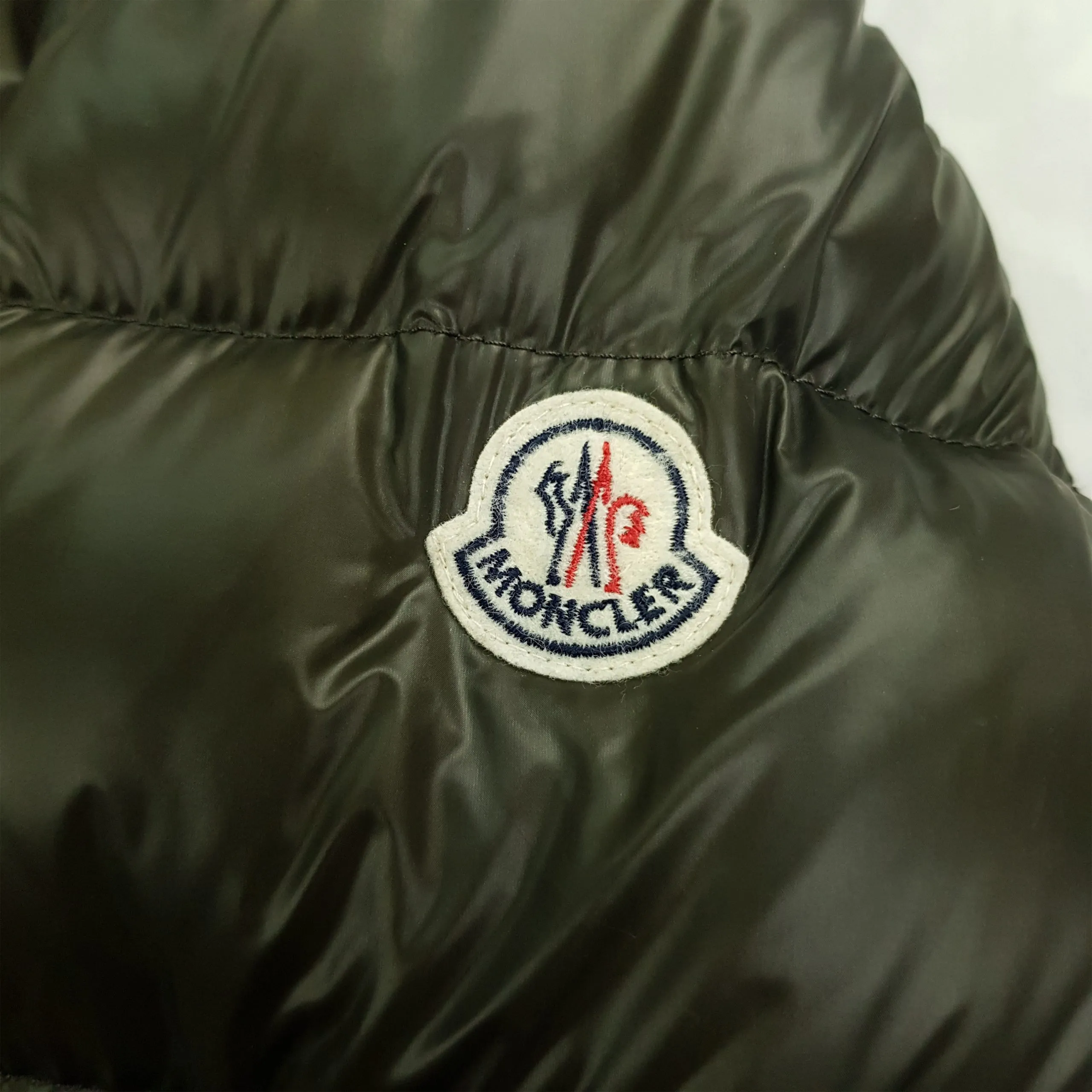 Moncler Marque - Authenticated Luxury Designer