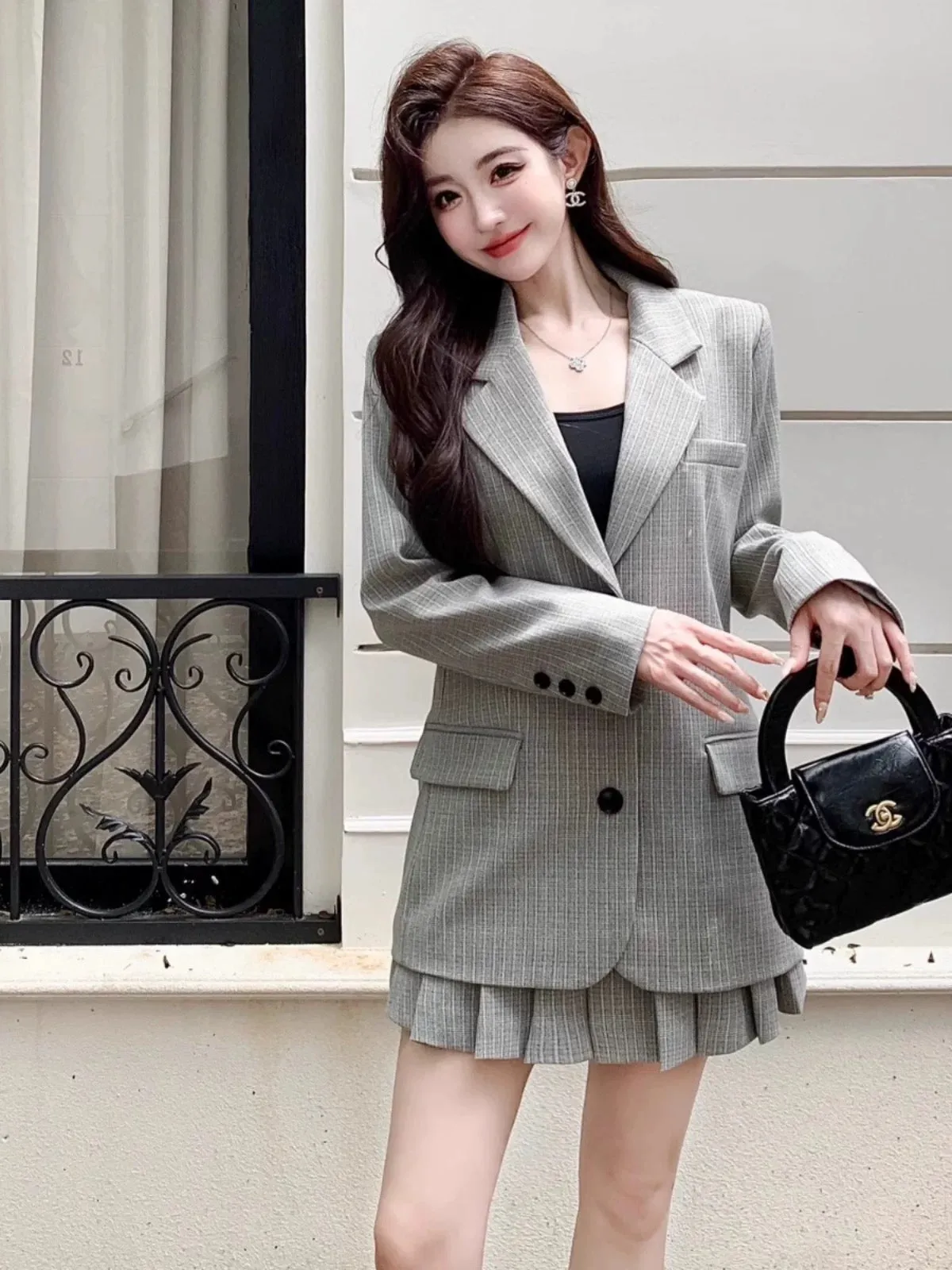 Nanyou niche designer British style striped silhouette casual suit jacket pleated skirt college suit autumn